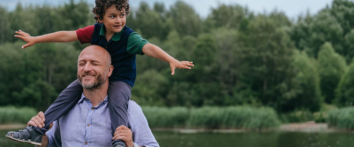 joyful-moment-as-a-father-carries-his-young-son-on-2024-05-06-21-10-48_resize