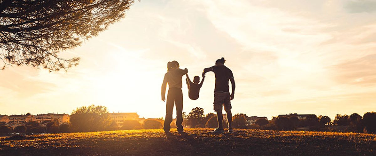 silhouette-of-happy-family-walking-in-the-meadow-a-2023-11-27-05-24-01_res